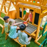 KidKraft Adventure Bend Two-Story Wood Swing Set with Clubhouse, Triple Slide, and Acrobar - Image 5