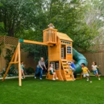 KidKraft Ridgemoor Perch Wood Swing Set with Playhouse, Rock Wall, and Tunnel Slide - Image 3