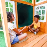 KidKraft Ridgemoor Perch Wood Swing Set with Playhouse, Rock Wall, and Tunnel Slide - Image 8