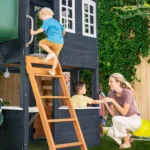 KidKraft Cozy Escape Navy Two-Story Wood Playhouse with Tube Slide and Clubhouse - Image 7