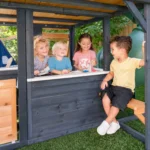 KidKraft Cozy Escape Navy Two-Story Wood Playhouse with Tube Slide and Clubhouse - Image 10