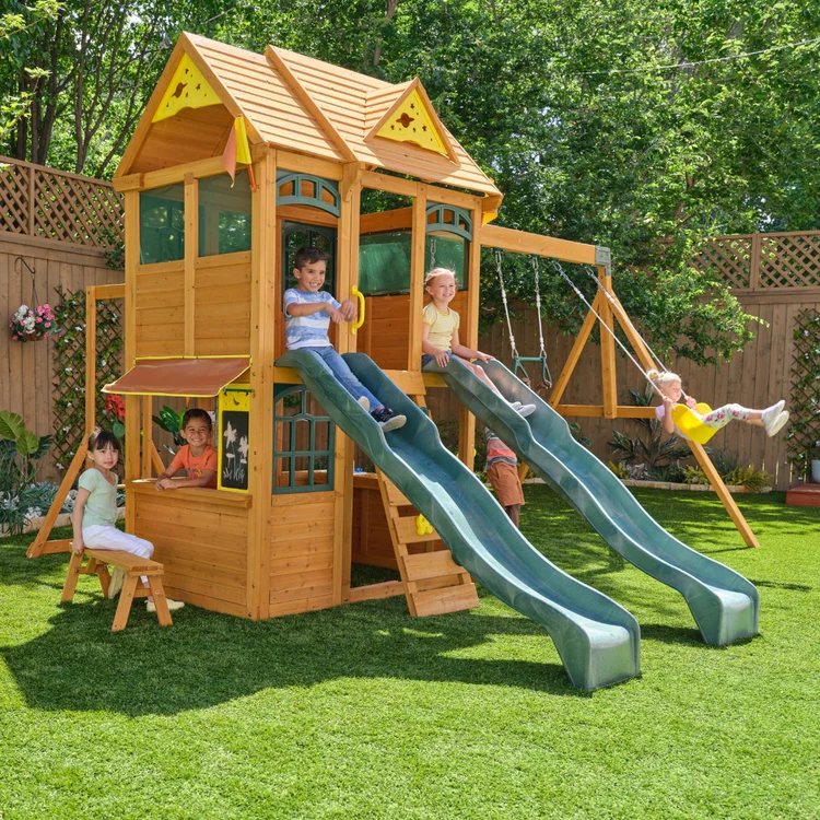 p55-i0.webp KidKraft Overland Heights Wood Swing Set with Monkey Bars, Double Wave Slide, and Play Kitchen - Image 1
