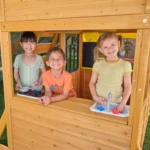 KidKraft Overland Heights Wood Swing Set with Monkey Bars, Double Wave Slide, and Play Kitchen - Image 6