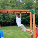 Gorilla Playsets Empire Extreme Wooden Swing Set with Monkey Bars, Clatter Bridge, Tower, and 3 Slides - Image 7