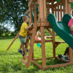 Canyon Creek All Cedar Swing Set Playset w/ Rockwall Upper Fort Belt Swings Web Swing Gray Wave Slide, and Play Kitchen - Image 6